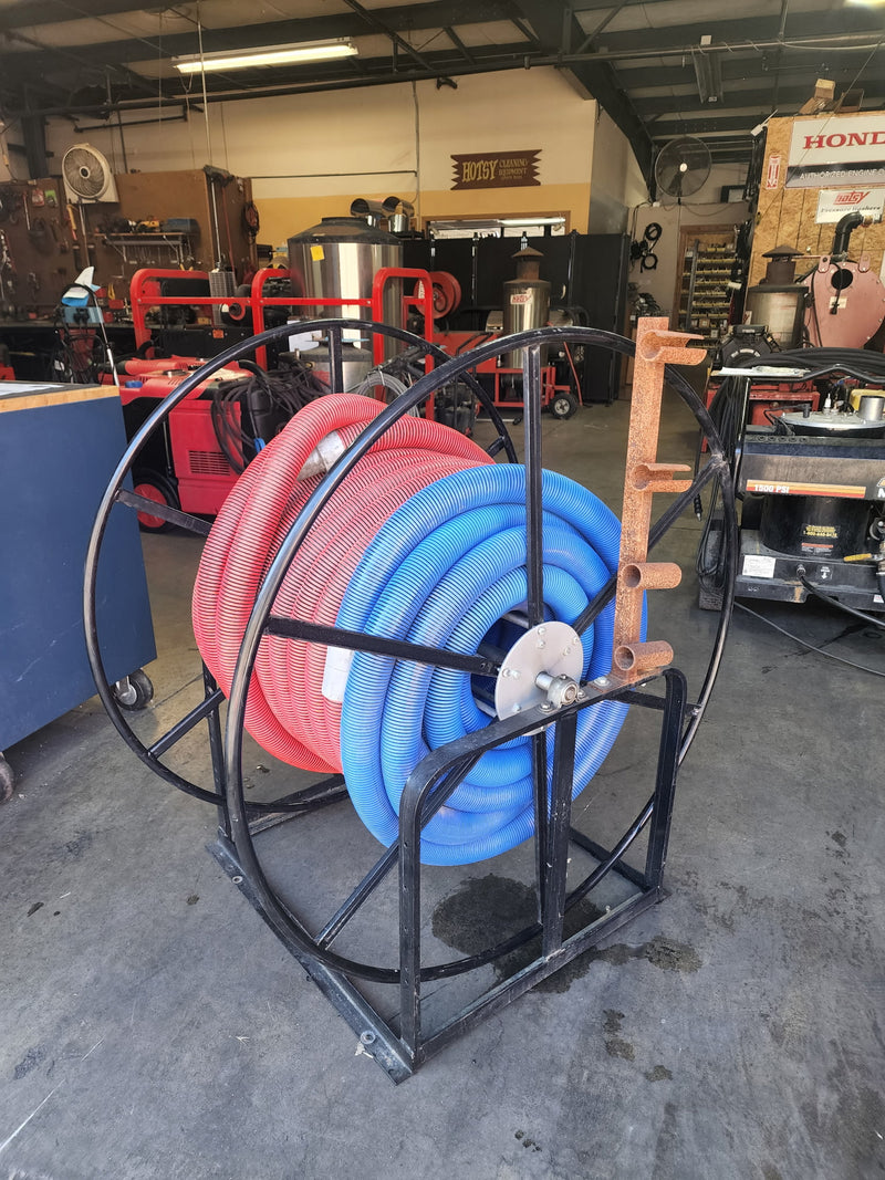 Used Rokan Low Profile Vacuum Hose reel with 150' Hose