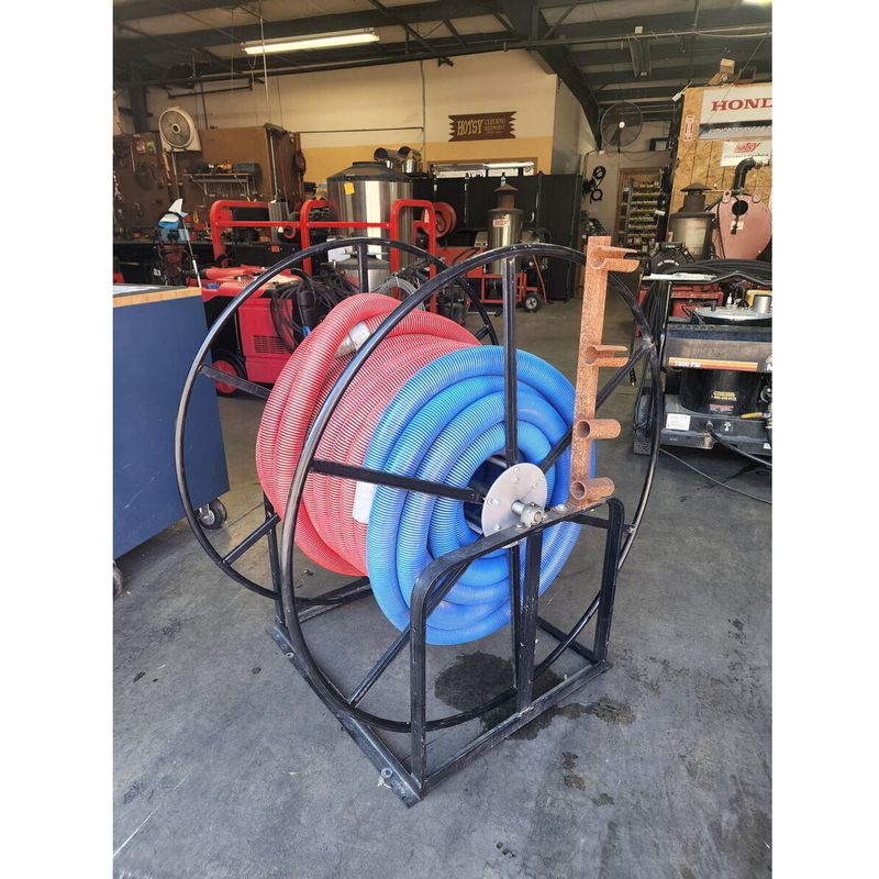 Used Rokan Low Profile Vacuum Hose reel with 150' Hose